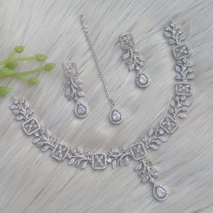 appears to be a silver-plated American diamond necklace set
