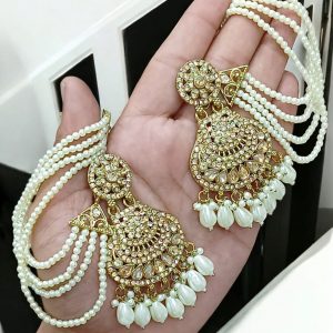golden tana earrings featuring a multi-layered pearl chain design.