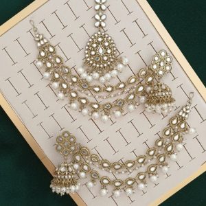 Pakistani-style mirror worked jhumka earrings and a tikli