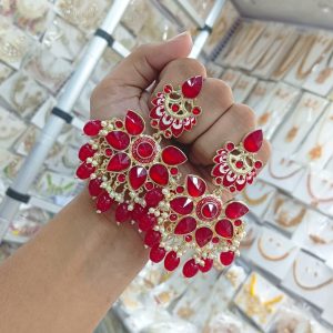 earrings are traditional Indian Kundan and pearl chandbali earrings
