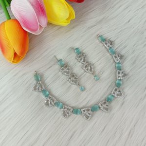 American Diamond or Cubic Zirconia studded necklace set featuring a silver-plated finish. (