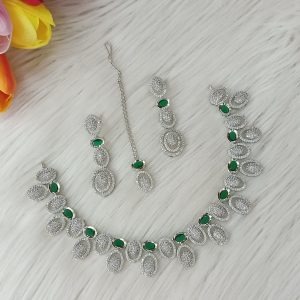 ewelry set is identified as a silver-plated American diamond necklace set