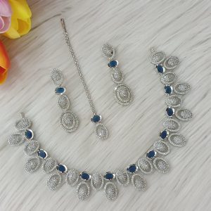 ewelry set is identified as a silver-plated American diamond necklace set