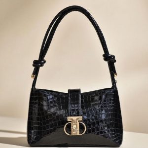 black shoulder bag with a bow detail.