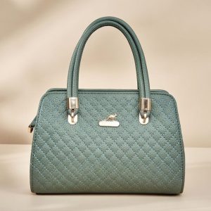 quilted green women’s handbag.