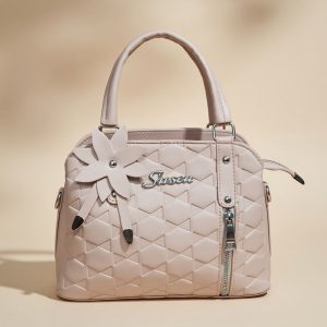 women’s fashion handbag made of PU leather with a flower accessory.