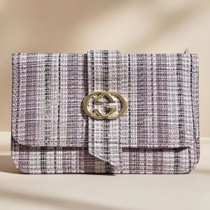 Gucci GG Marmont small shoulder bag in black matelassé leather.